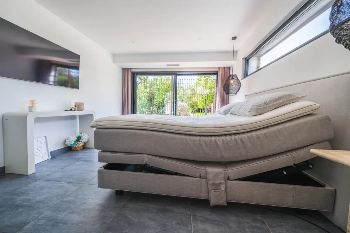 Bed in a bright bedroom