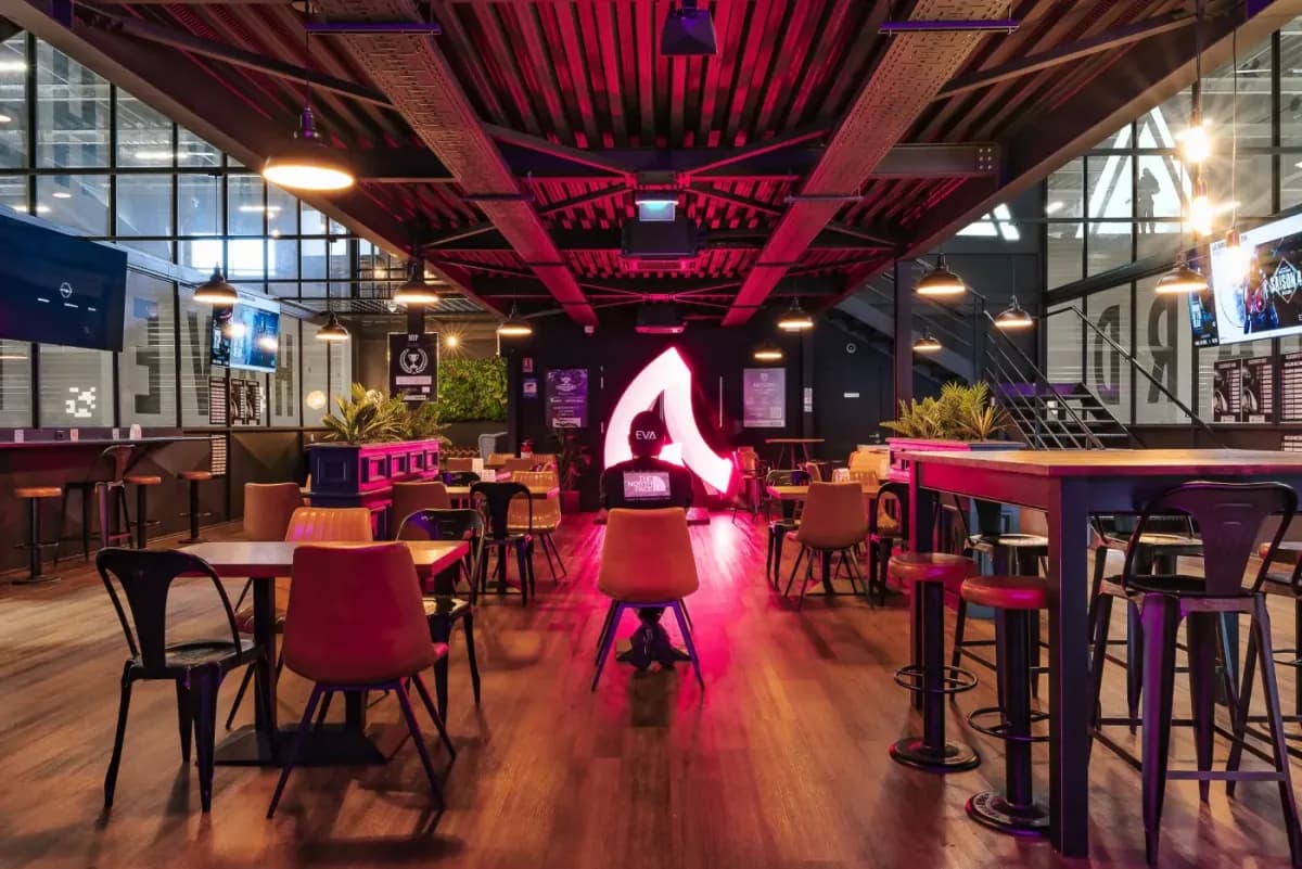 Bar and room lit in red neon