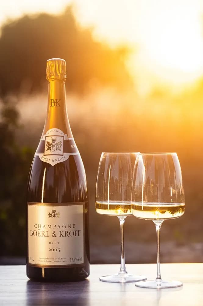 Champagne and two glasses in the evening light